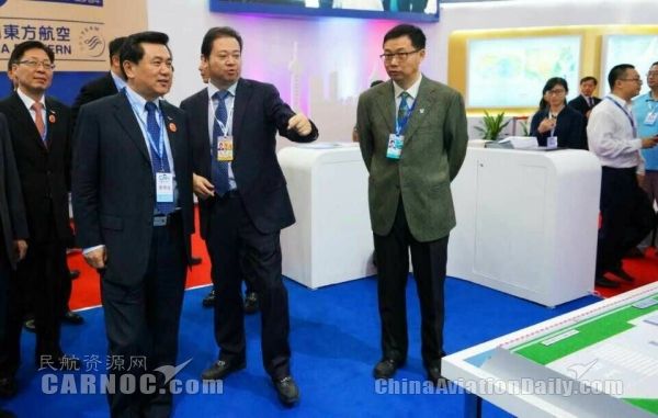 民航局長:民航推進(jìn)軍民融合 促進(jìn)兩翼齊飛376141_ 民航局長:民航推進(jìn)軍民融合 促進(jìn)兩翼齊飛